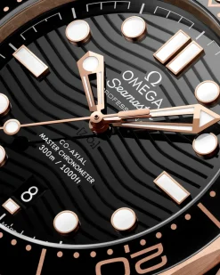 42 mm, Sedna™‑Gold mit Kautschukband