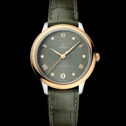 34 mm, Stahl ‑ Gelbgold mit Lederarmband